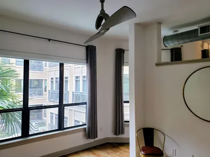 a room with water heater on the wall