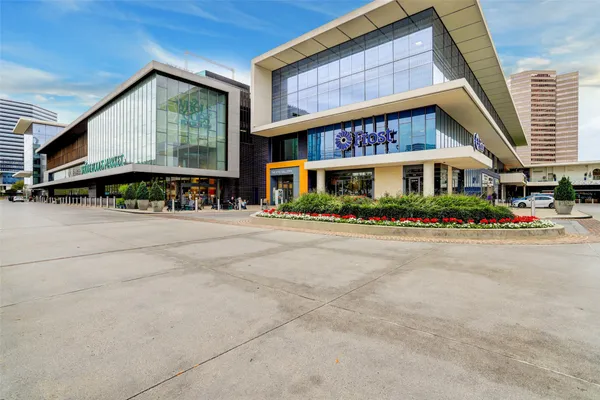 a view of a backyard with potted plants