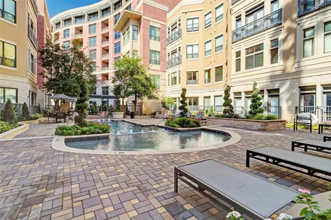 a view of pool with outdoor seating