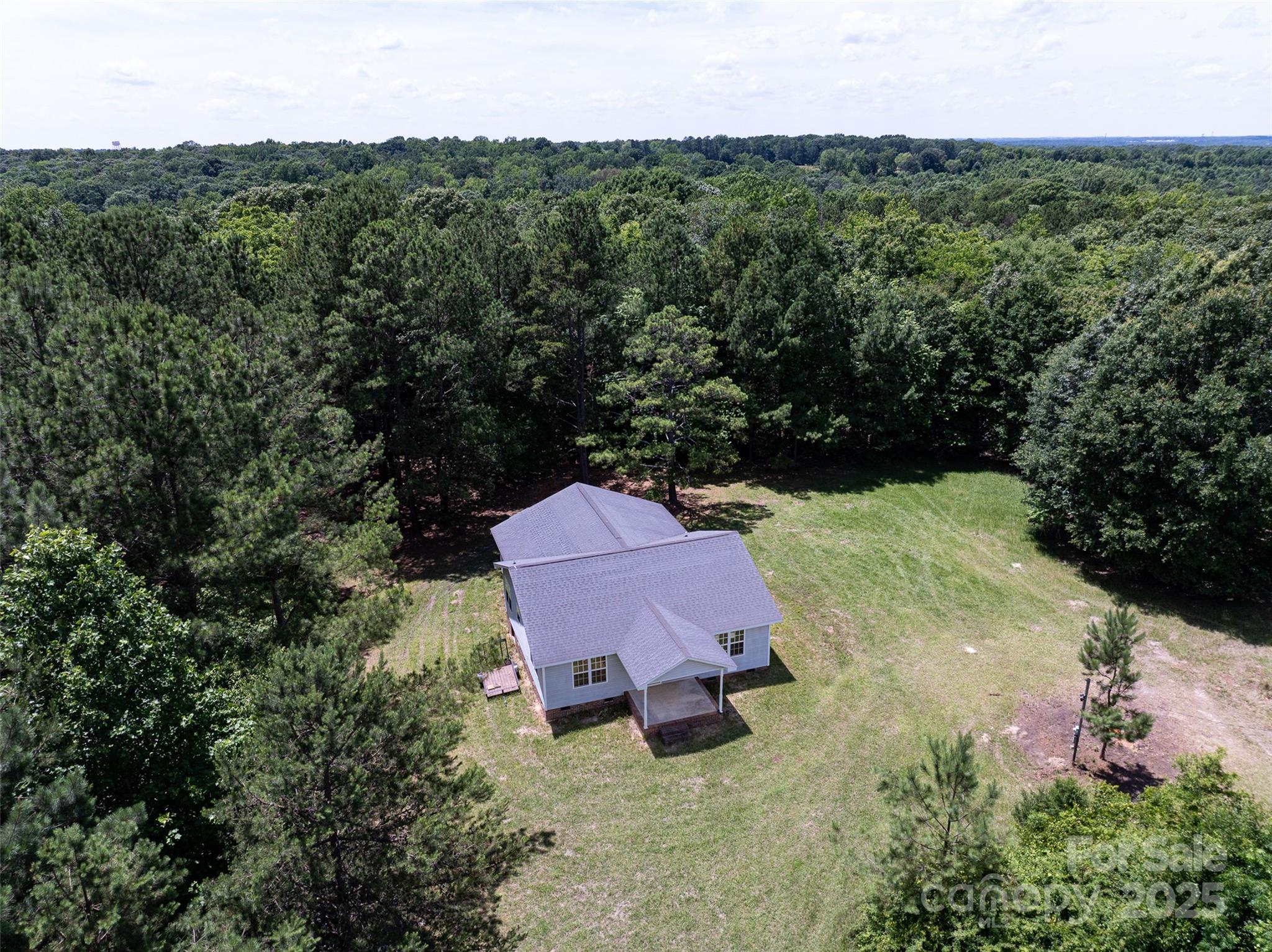 5410 A R Gordon Road Waxhaw, NC 28173 - Photo 19 of 31 an aerial view of a house with a yard