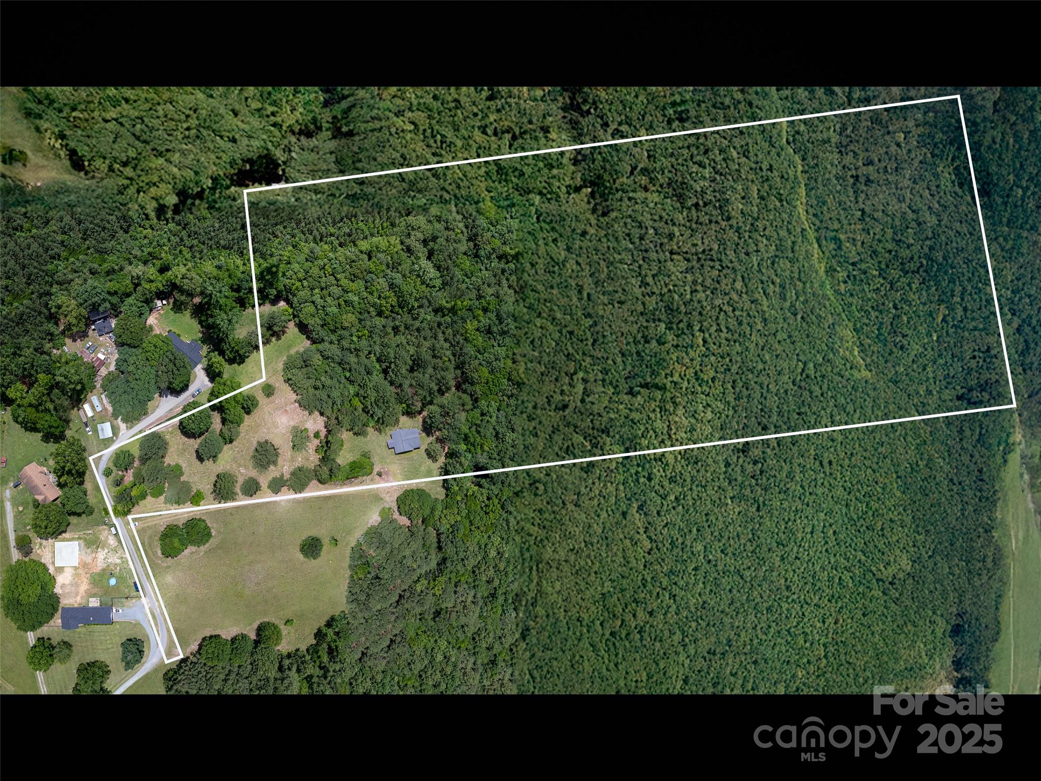 5410 A R Gordon Road Waxhaw, NC 28173 - Photo 2 of 31 a view of a small yard