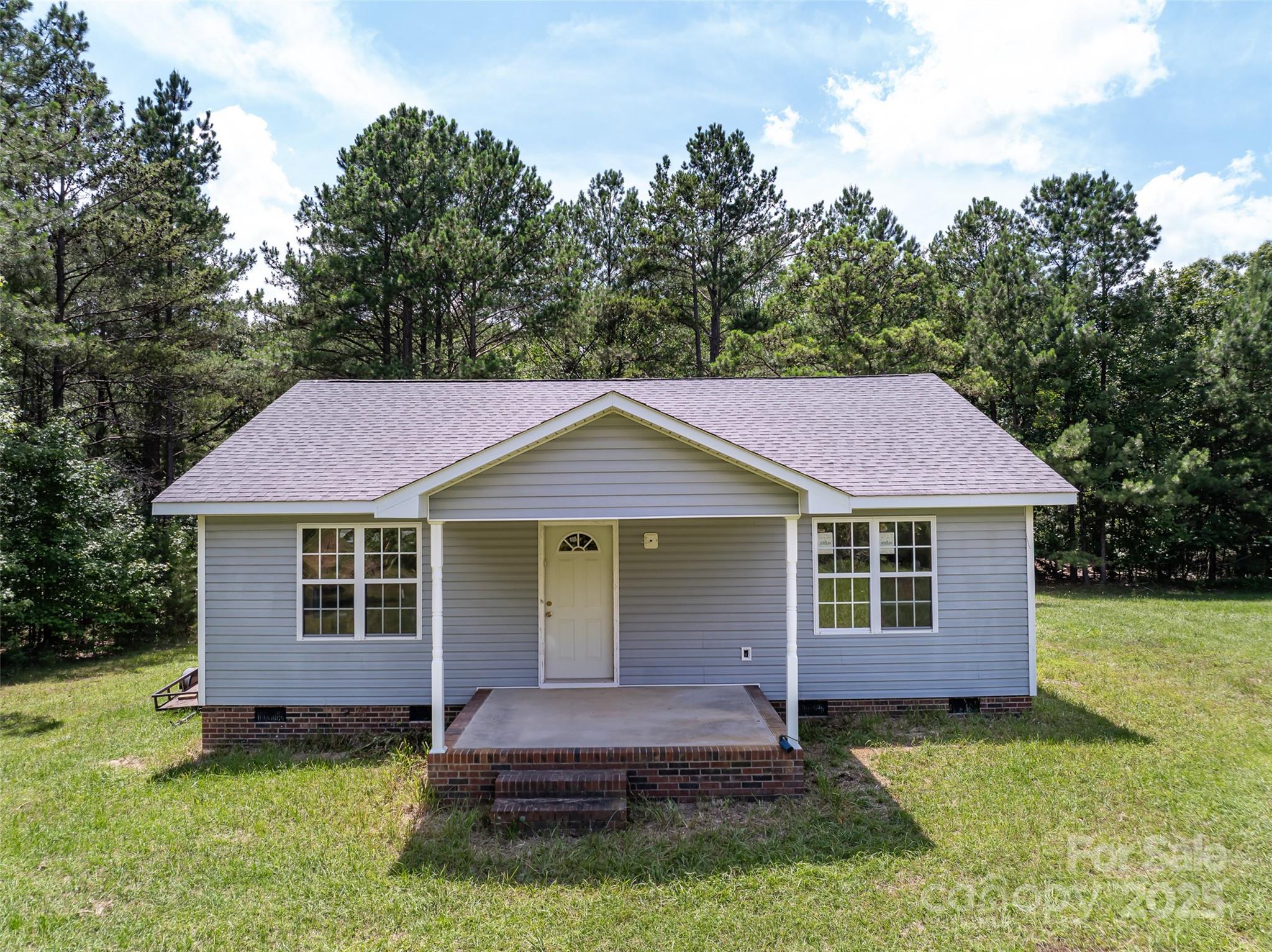 5410 A R Gordon Road Waxhaw, NC 28173 - Photo 22 of 31 a house that has a yard