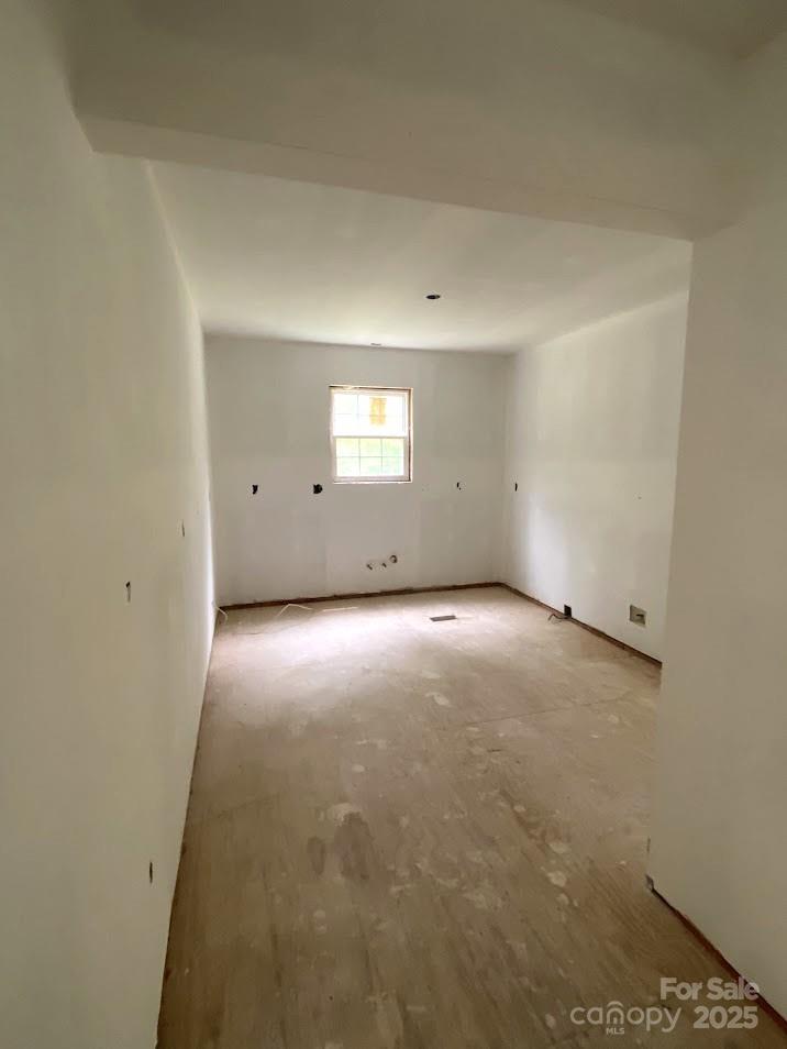 5410 A R Gordon Road Waxhaw, NC 28173 - Photo 25 of 31 an empty room with a empty space and windows