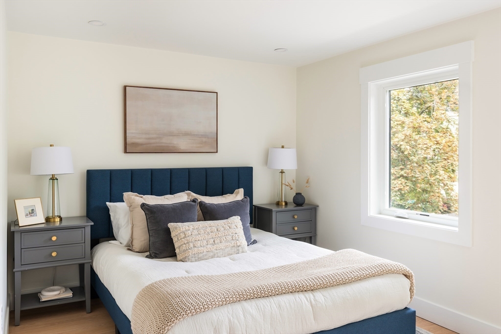 76 Harding Street Newton, MA 02465 - Photo 17 of 27 a bedroom with bed and window