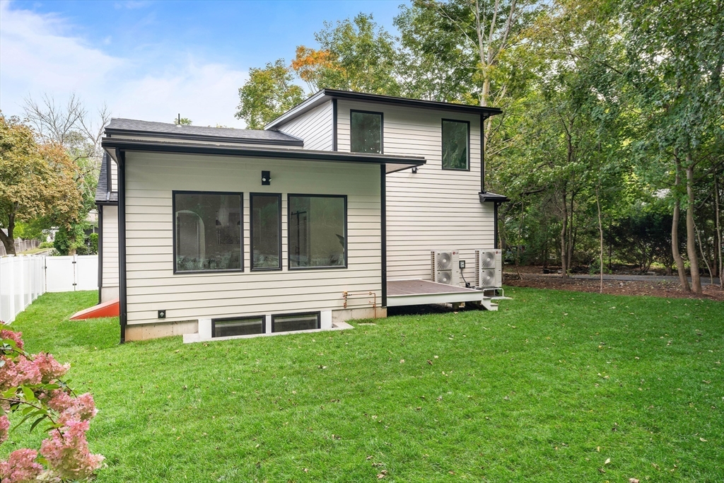 76 Harding Street Newton, MA 02465 - Photo 26 of 27 a view of a house with a yard