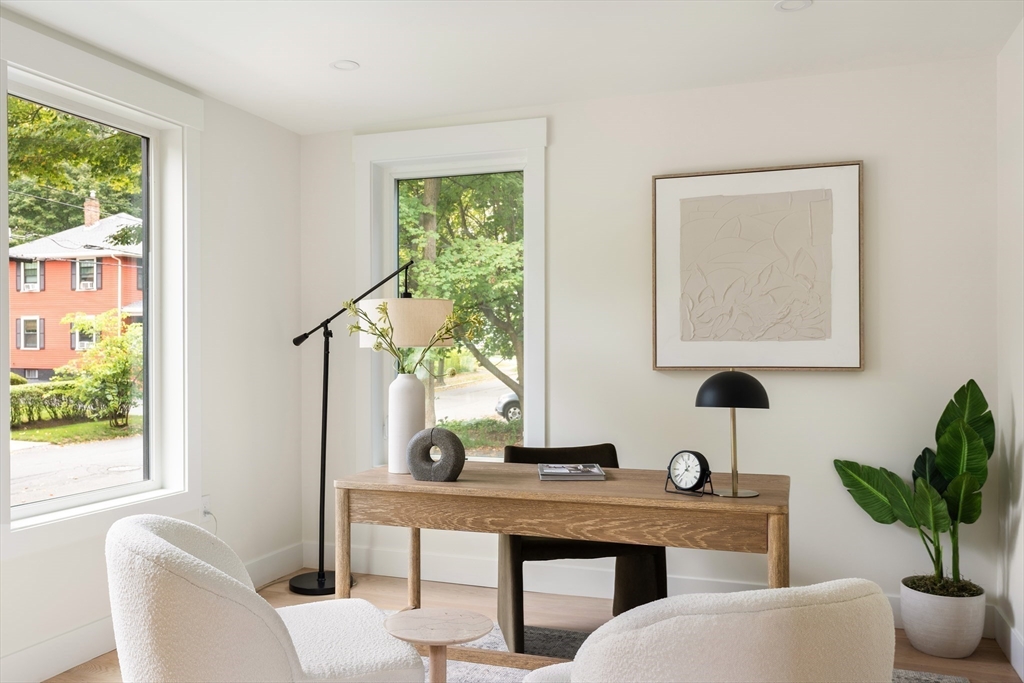 76 Harding Street Newton, MA 02465 - Photo 9 of 27 a view of a workspace with a window and couch