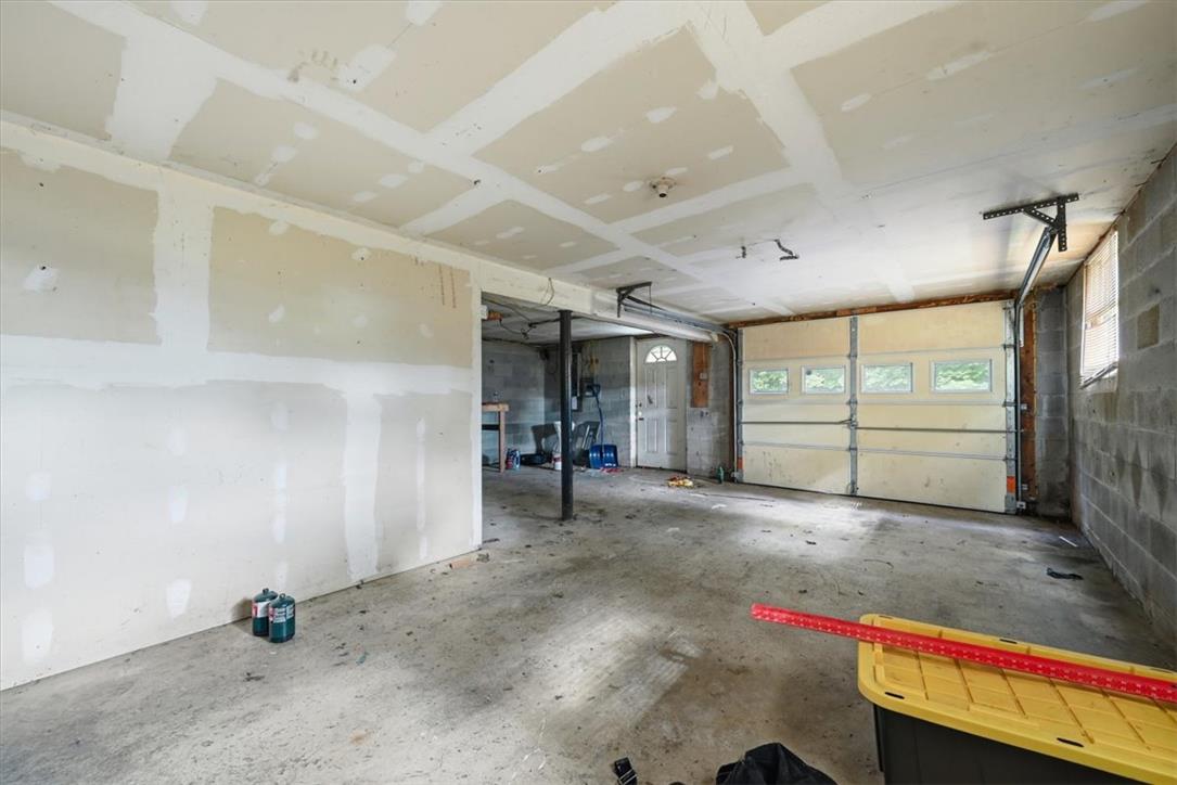 9870 North Delaware Drive Bangor, PA 18013 - Photo 39 of 62 An expansive unfinished lower level provides ample utility space and drive-in garage access.