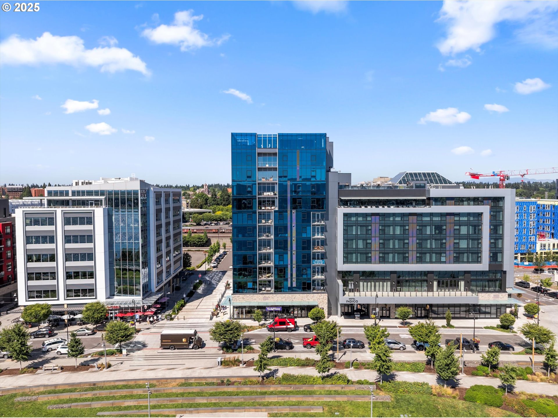 a view of swimming pool with outdoor seating and yard in the back