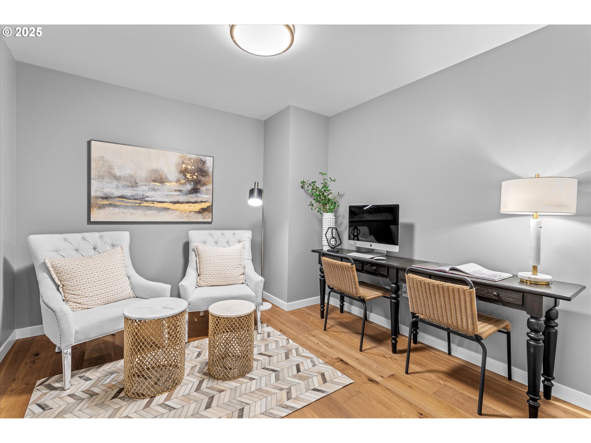 590 Waterfront Way, Unit 700 Vancouver, WA 98660 - Photo 19 of 35 a living room with furniture and a wooden floor