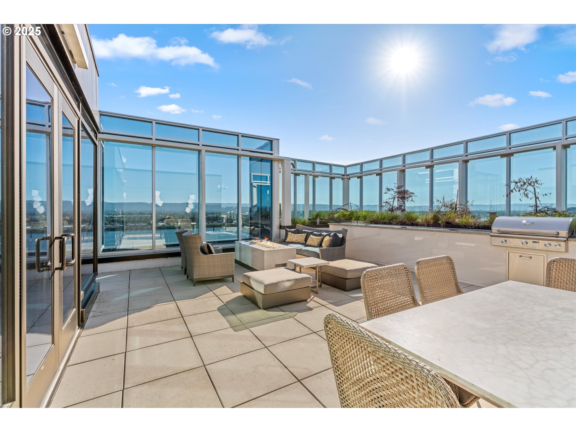 590 Waterfront Way, Unit 700 Vancouver, WA 98660 - Photo 26 of 35 a living room with patio furniture and a large window