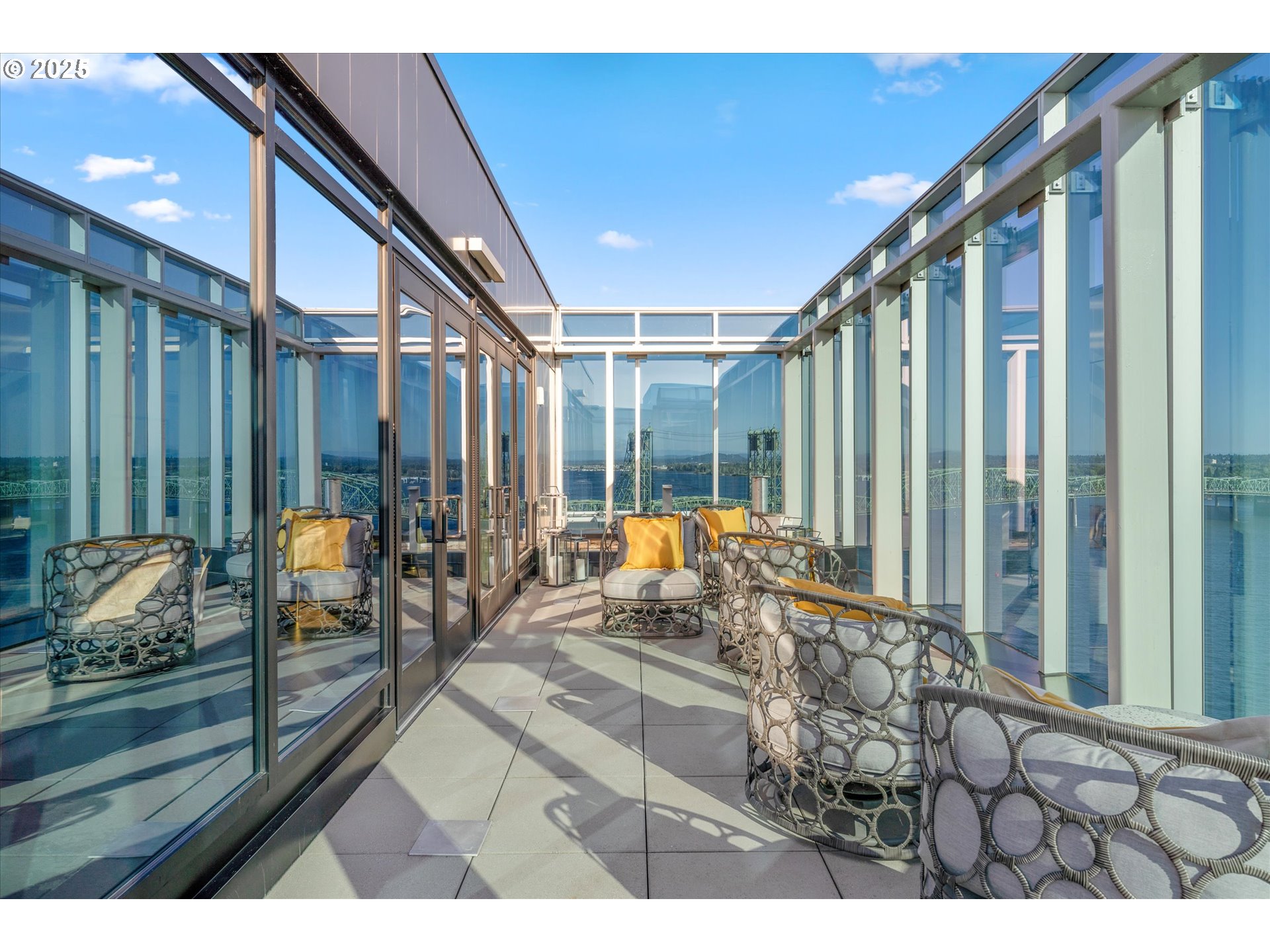 590 Waterfront Way, Unit 700 Vancouver, WA 98660 - Photo 27 of 35 a living room with furniture and a large window