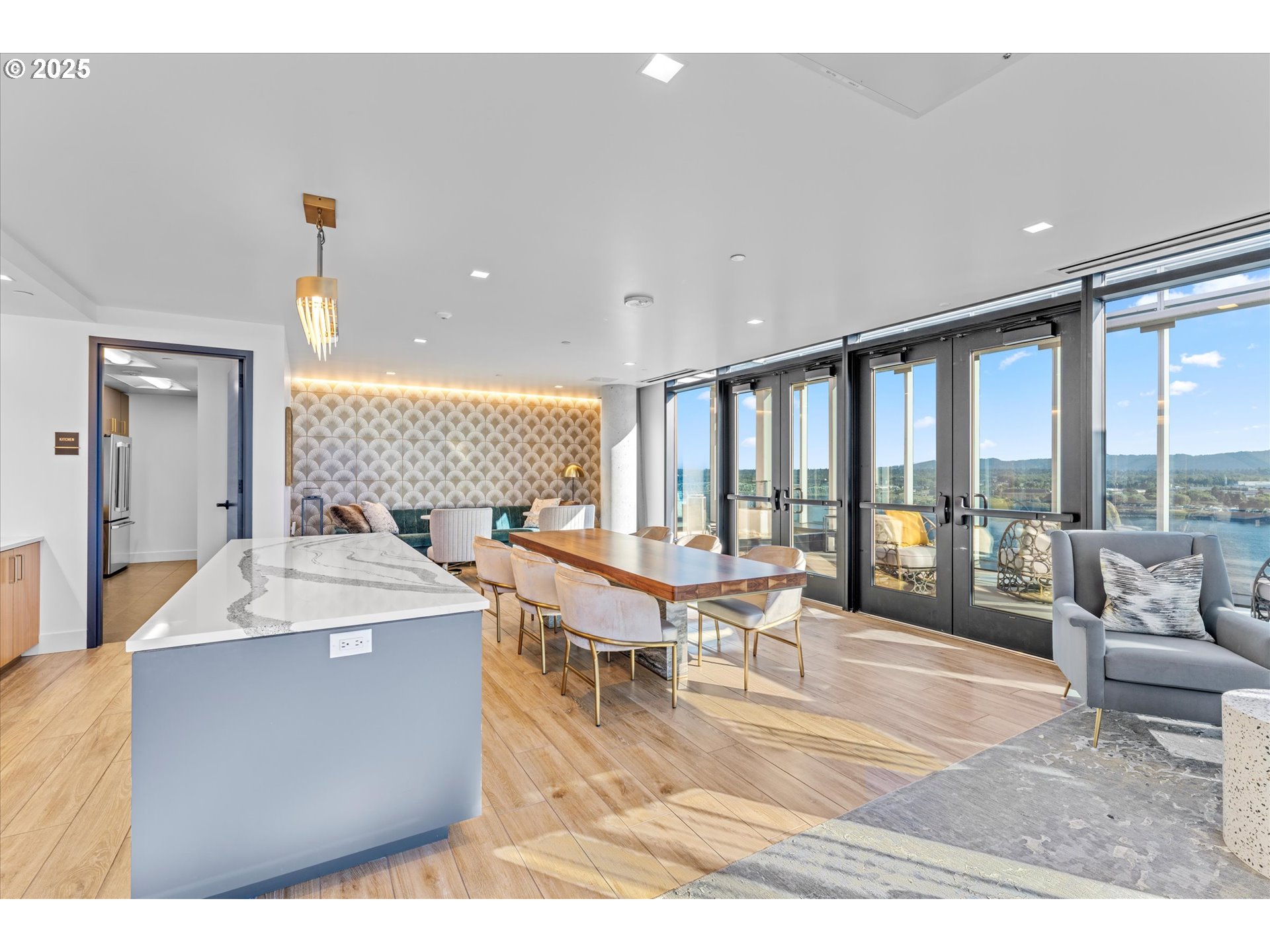 590 Waterfront Way, Unit 700 Vancouver, WA 98660 - Photo 28 of 35 a living room with furniture a rug and white walls