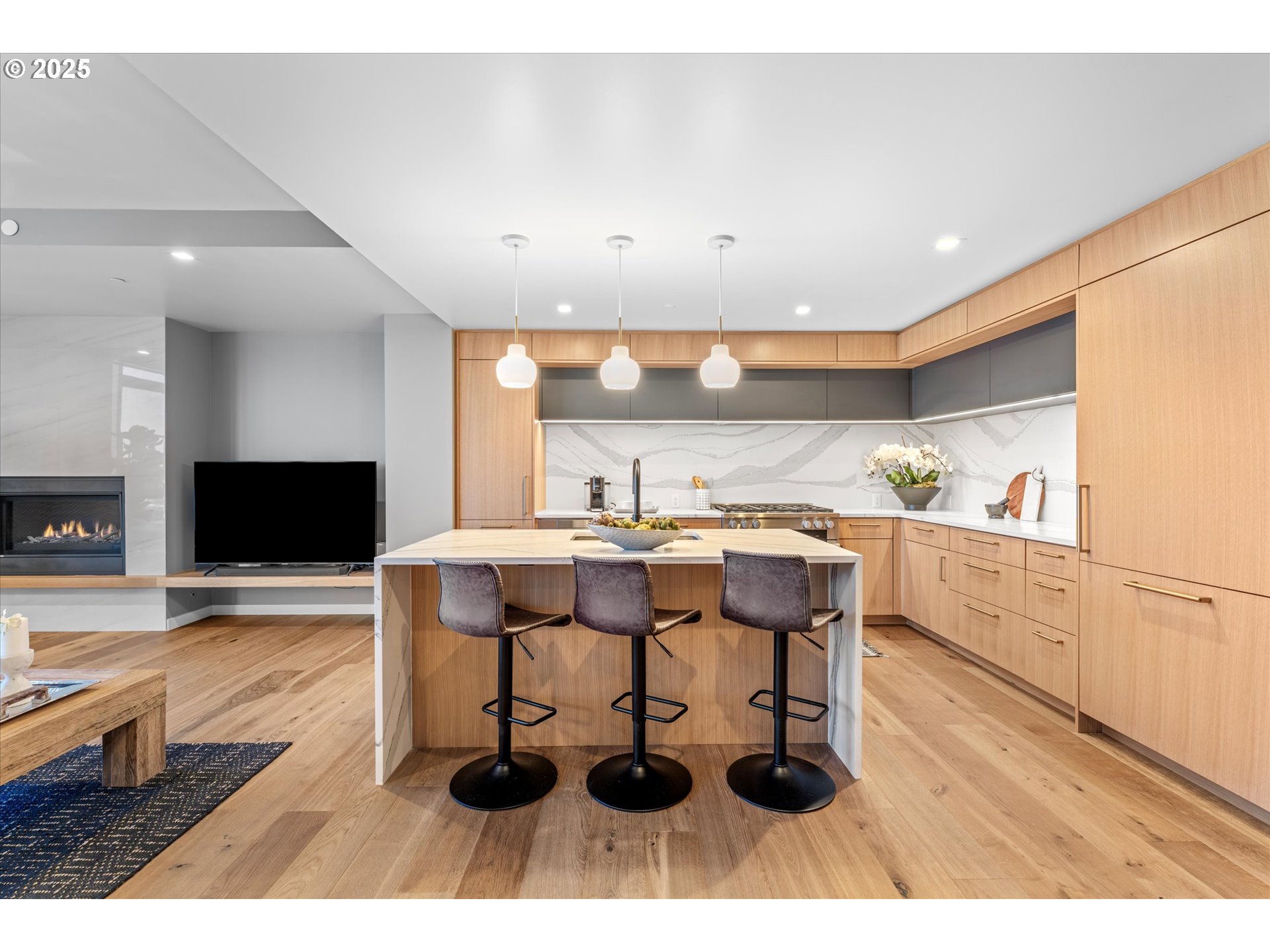 590 Waterfront Way, Unit 700 Vancouver, WA 98660 - Photo 3 of 35 a living room with furniture and a flat screen tv