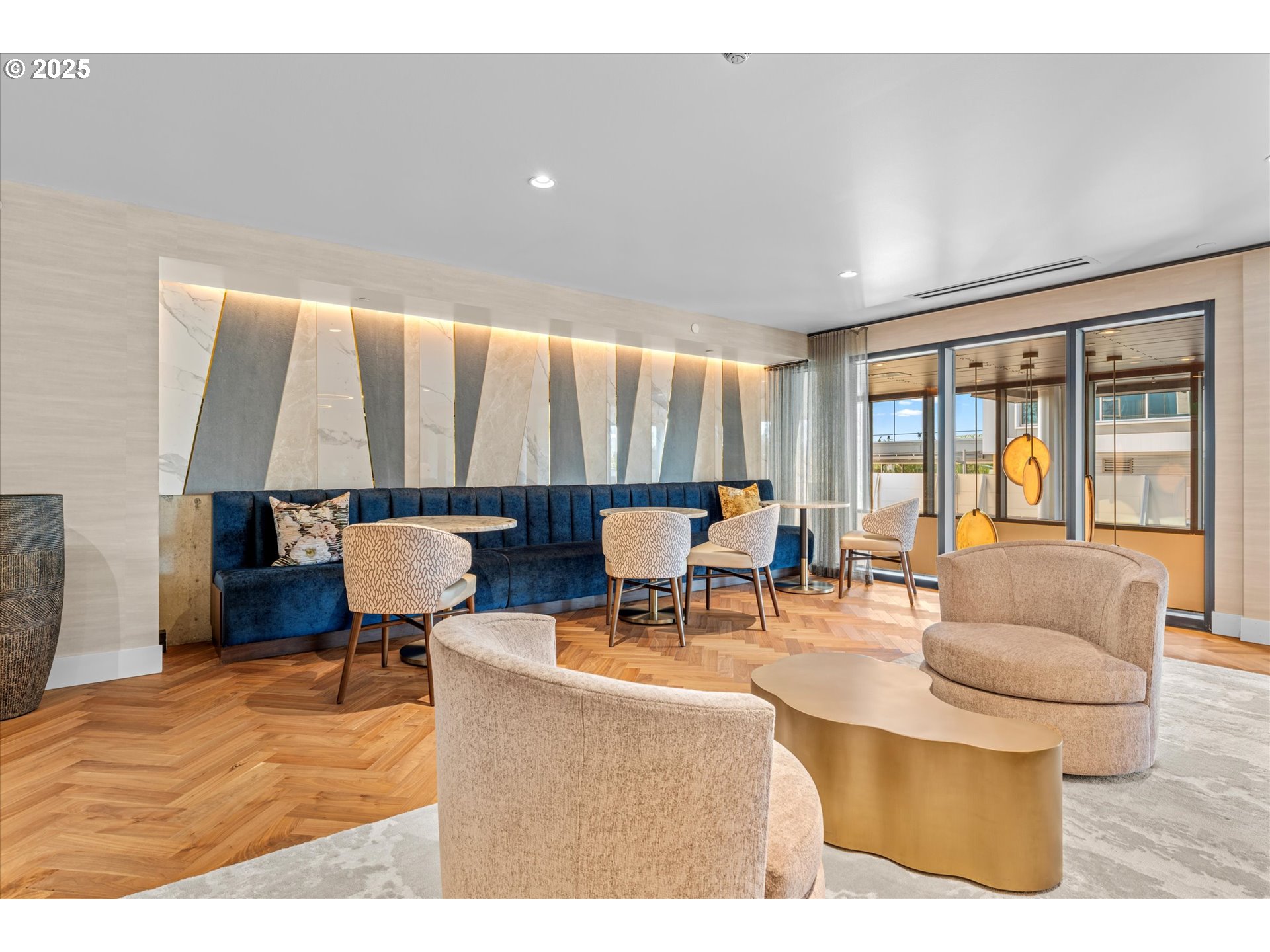 590 Waterfront Way, Unit 700 Vancouver, WA 98660 - Photo 33 of 35 a living room with furniture and a large window