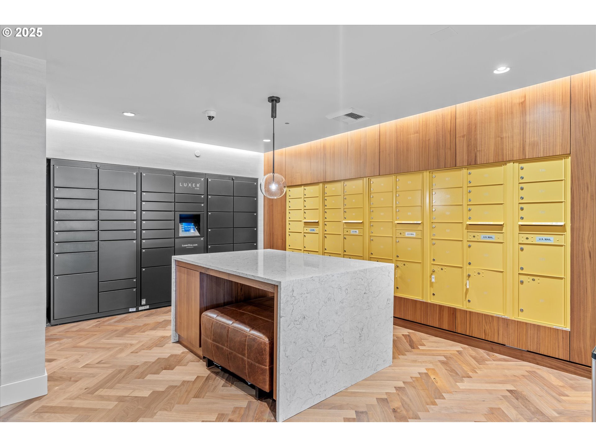 590 Waterfront Way, Unit 700 Vancouver, WA 98660 - Photo 34 of 35 a kitchen with stainless steel appliances kitchen island granite countertop a refrigerator and a stove