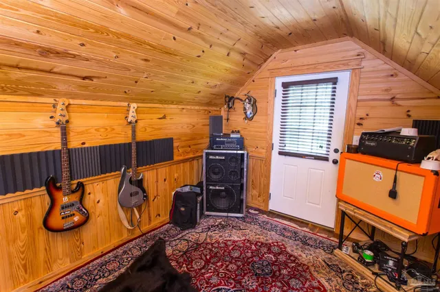 a view of an chairs and table in a balcony