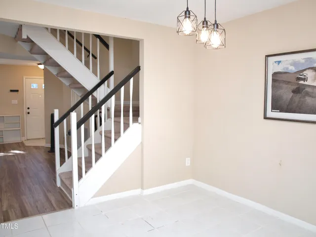 a view of a tree in a yard