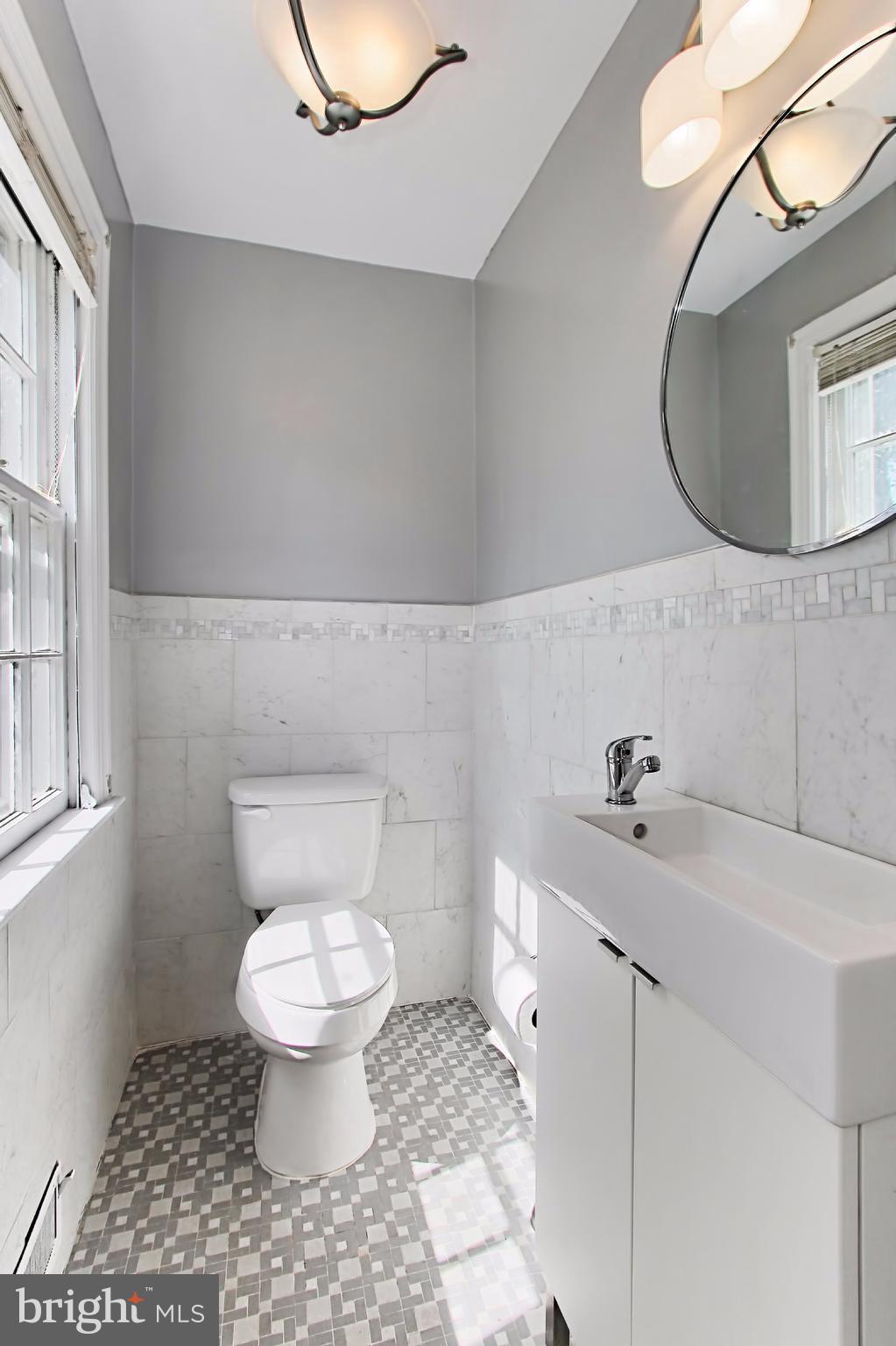 2500 34th Street Southeast Washington, DC 20020 - Photo 11 of 30 Main level powder room/half bathroom