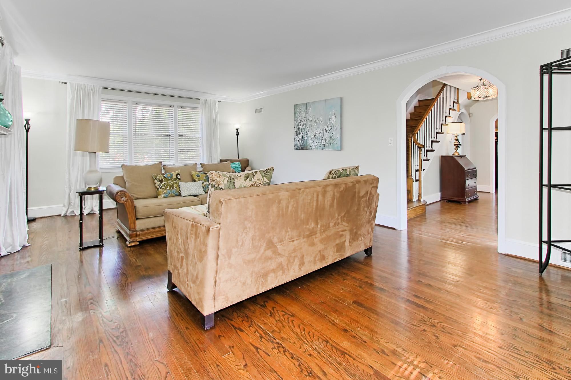 2500 34th Street Southeast Washington, DC 20020 - Photo 3 of 30 Living Room features wood floors and fireplace