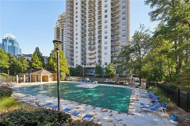 a view of city with tall buildings