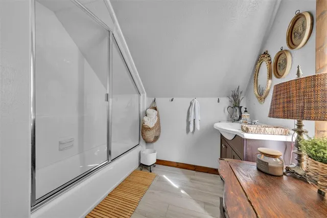 a view of kitchen with furniture and wooden floor