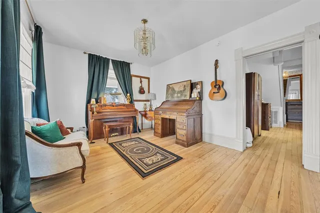 a living room with couch and a table