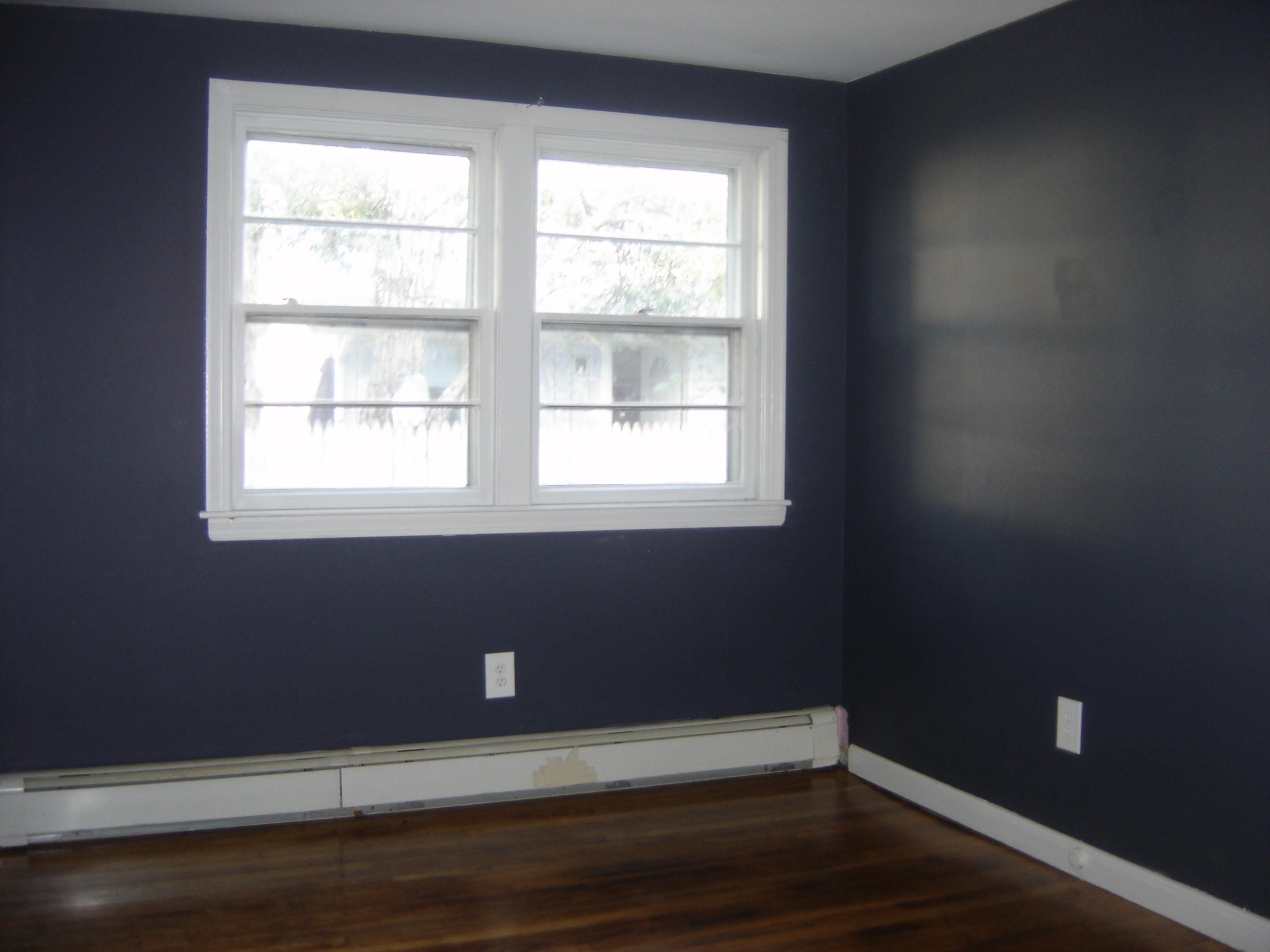 75 Quaker Road Hyannis, MA 02601 - Photo 12 of 28 a view of a small space with wooden floor and a window
