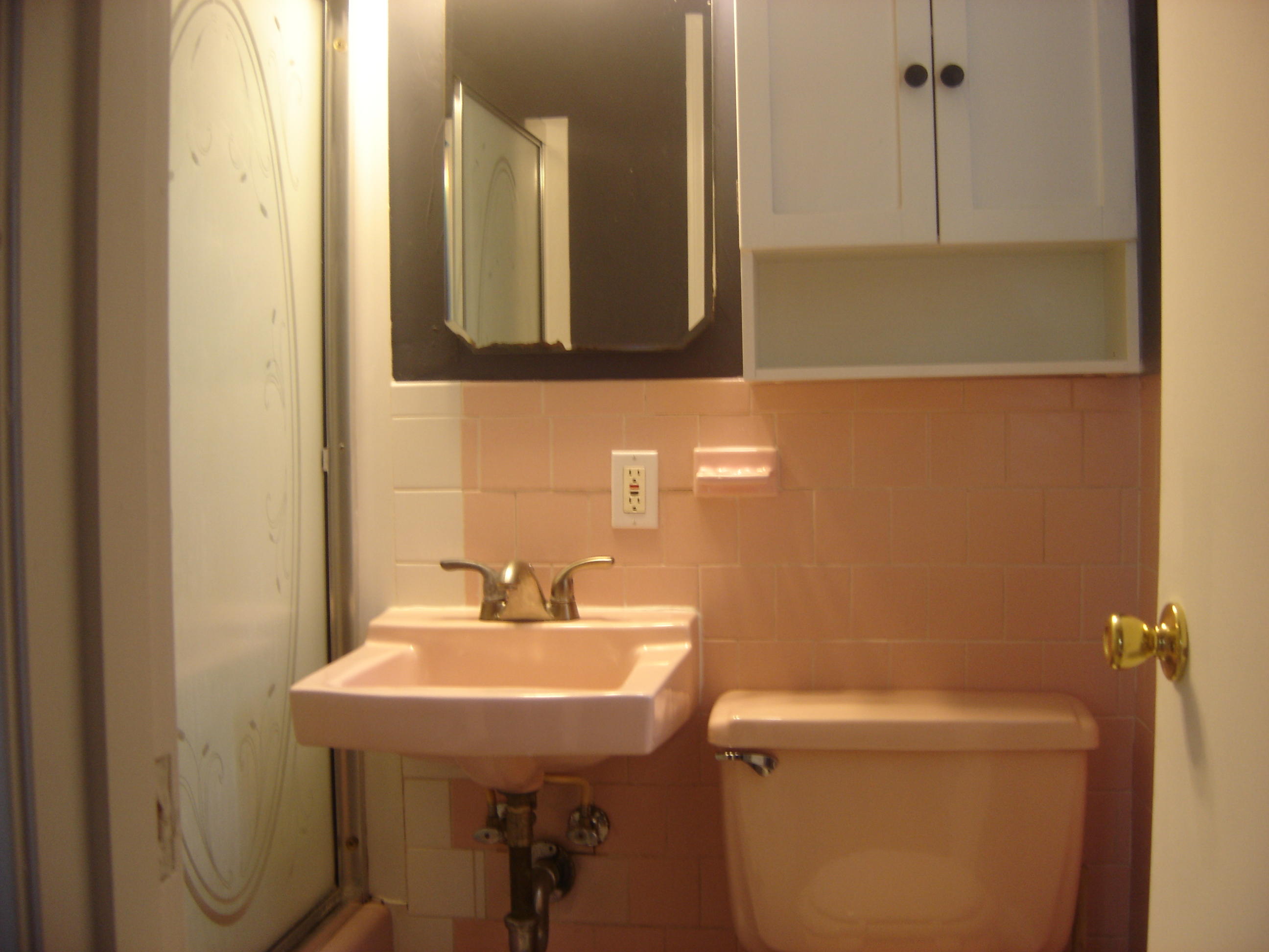 75 Quaker Road Hyannis, MA 02601 - Photo 18 of 28 a bathroom with a sink a toilet and mirror