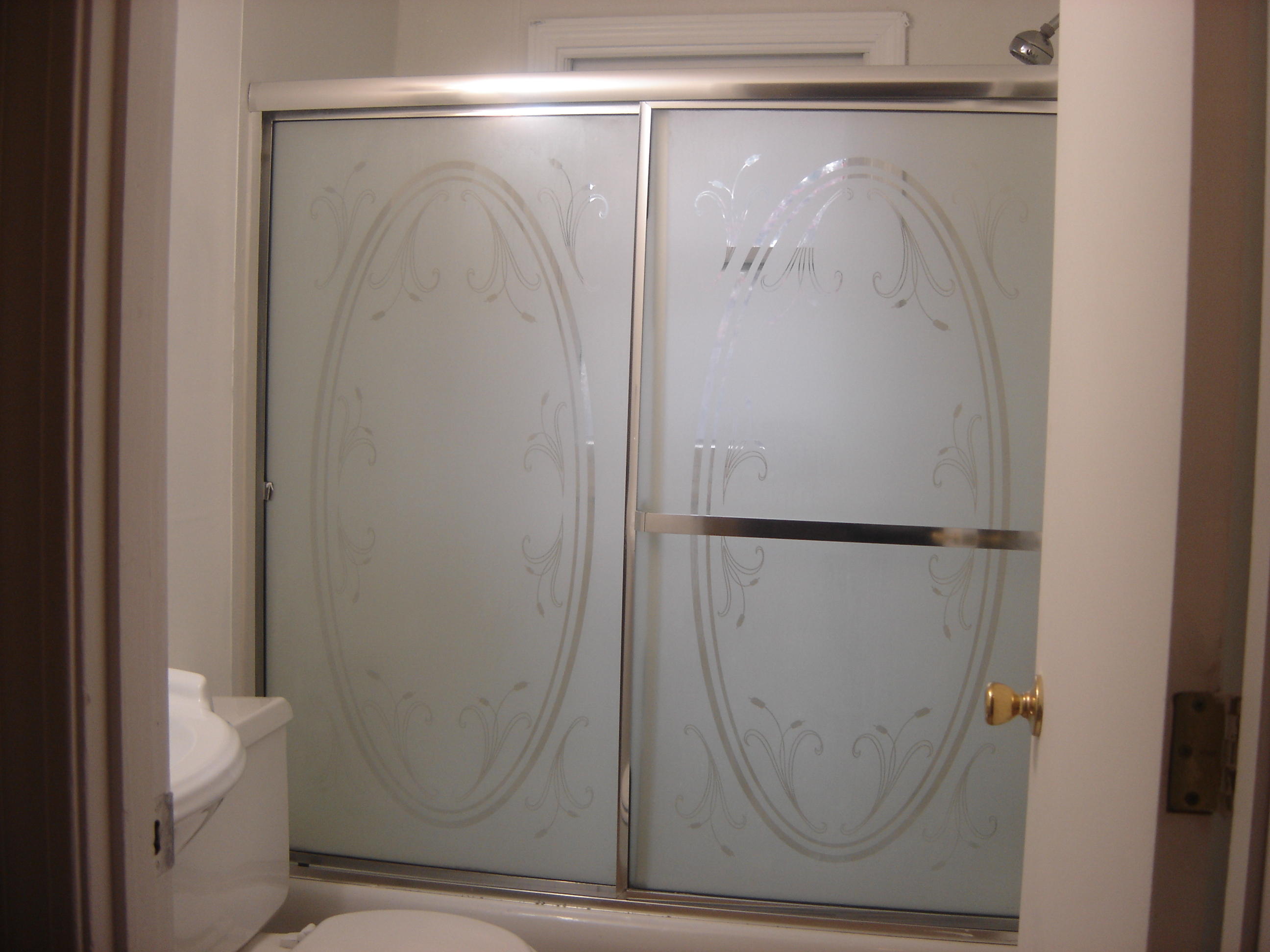 75 Quaker Road Hyannis, MA 02601 - Photo 21 of 28 a bathroom with a glass shower door