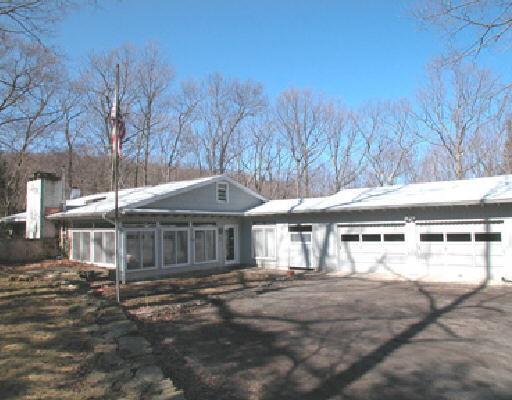 16 Olmstead Road Redding, CT 06896 - Photo 1 of 1 a dinning table and chairs in the patio