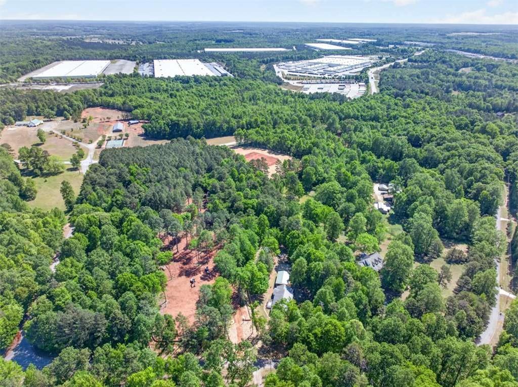 386 Ridgewood Drive Pendergrass, GA 30567 - Photo 48 of 50 an aerial view of a city with lots of residential buildings