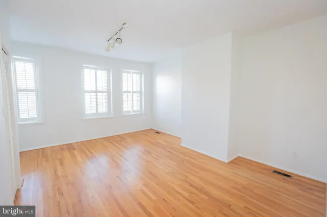 a bathroom with a sink a toilet and bathtub