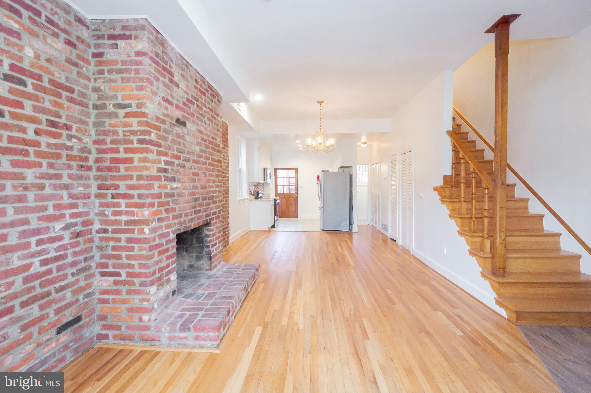 1814 15th Street Northwest, Unit A Washington, DC 20009 - Photo 9 of 15 a view of a hallway with wooden floor and staircase