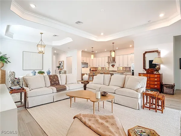 a outdoor space with patio the couches and a fireplace