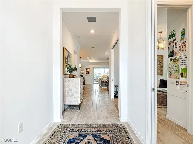 a spacious bathroom with a tub shower and window