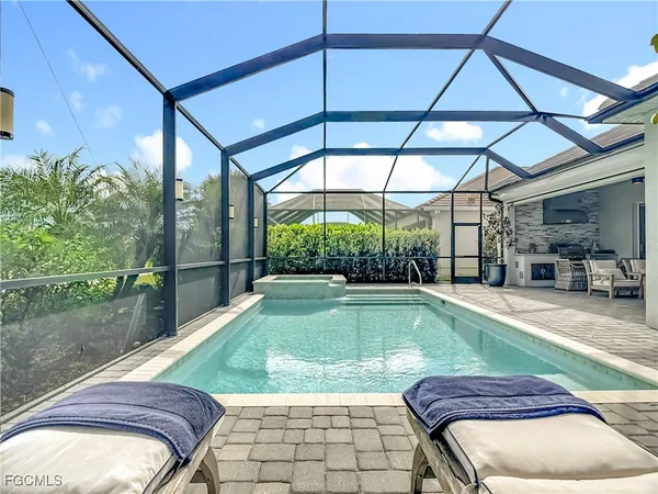 a living room with a couch and a large window