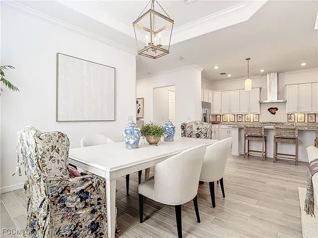a view of a patio with couches chairs and a umbrella
