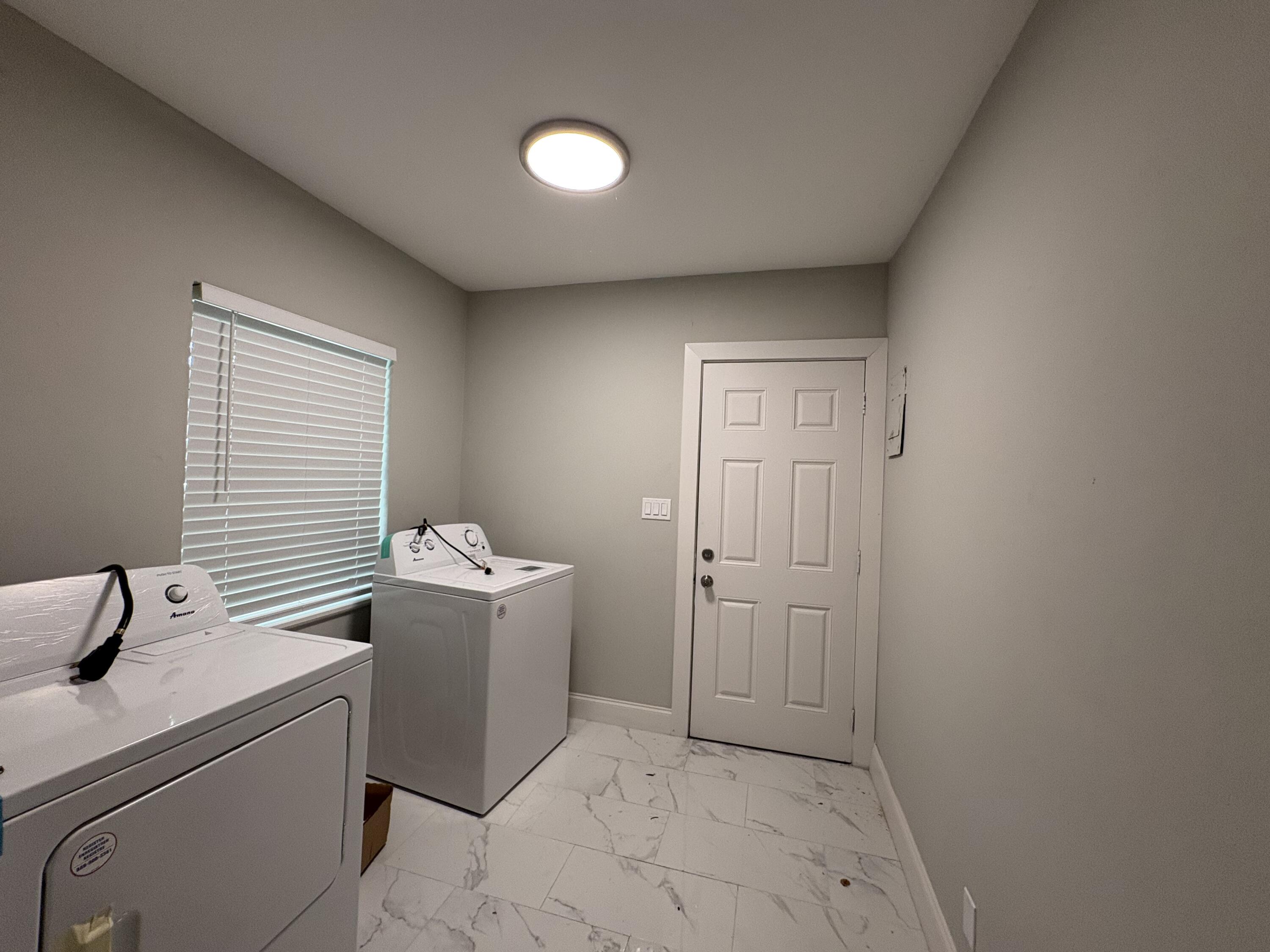 1010 Mayflower Road Fort Pierce, FL 34950 - Photo 12 of 27 a view of a storage & utility room