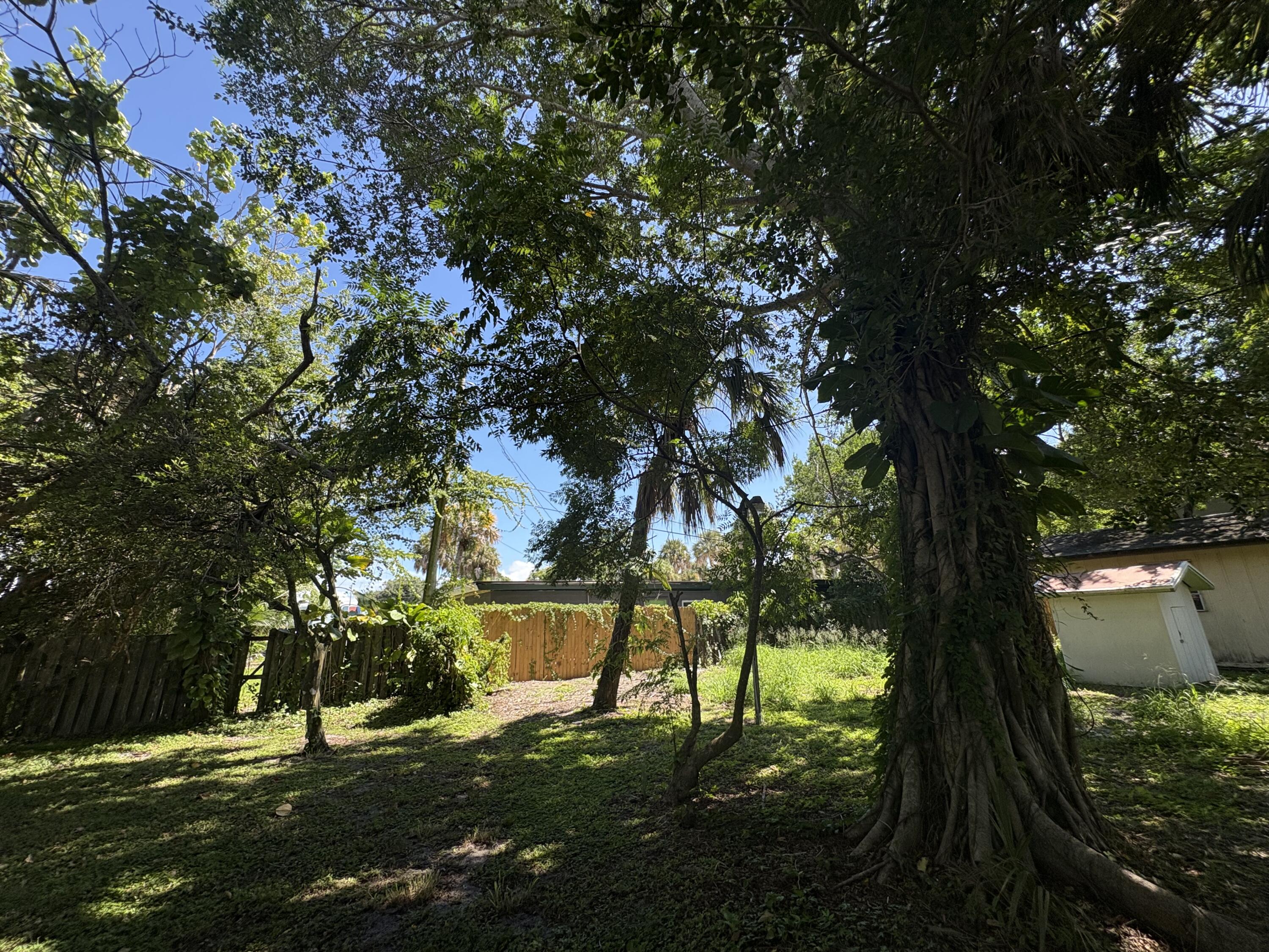 1010 Mayflower Road Fort Pierce, FL 34950 - Photo 18 of 27 a view of outdoor space with garden