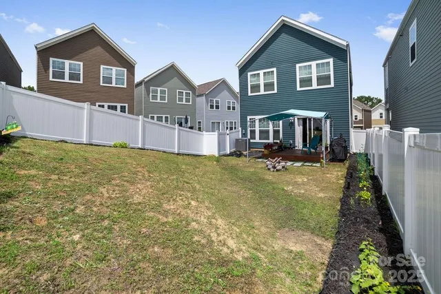 a front view of a house with a yard outdoor seating and yard