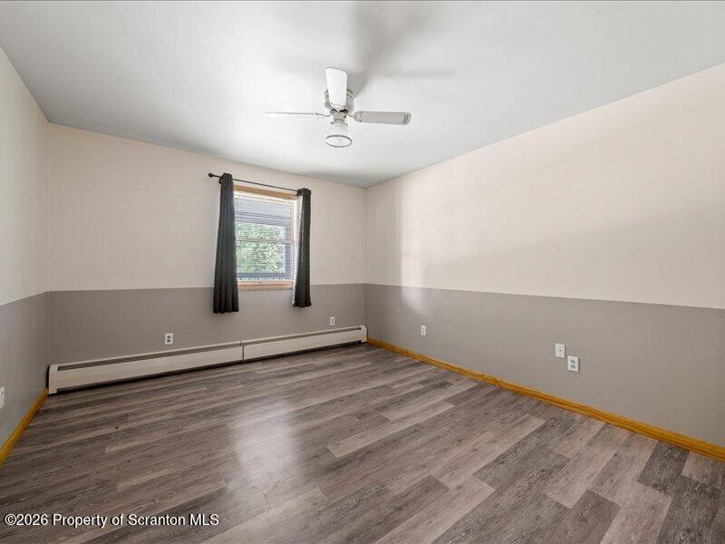 9-17 Vago Road Tunkhannock, PA 18657 - Photo 18 of 57 wooden floor in an empty room with a window