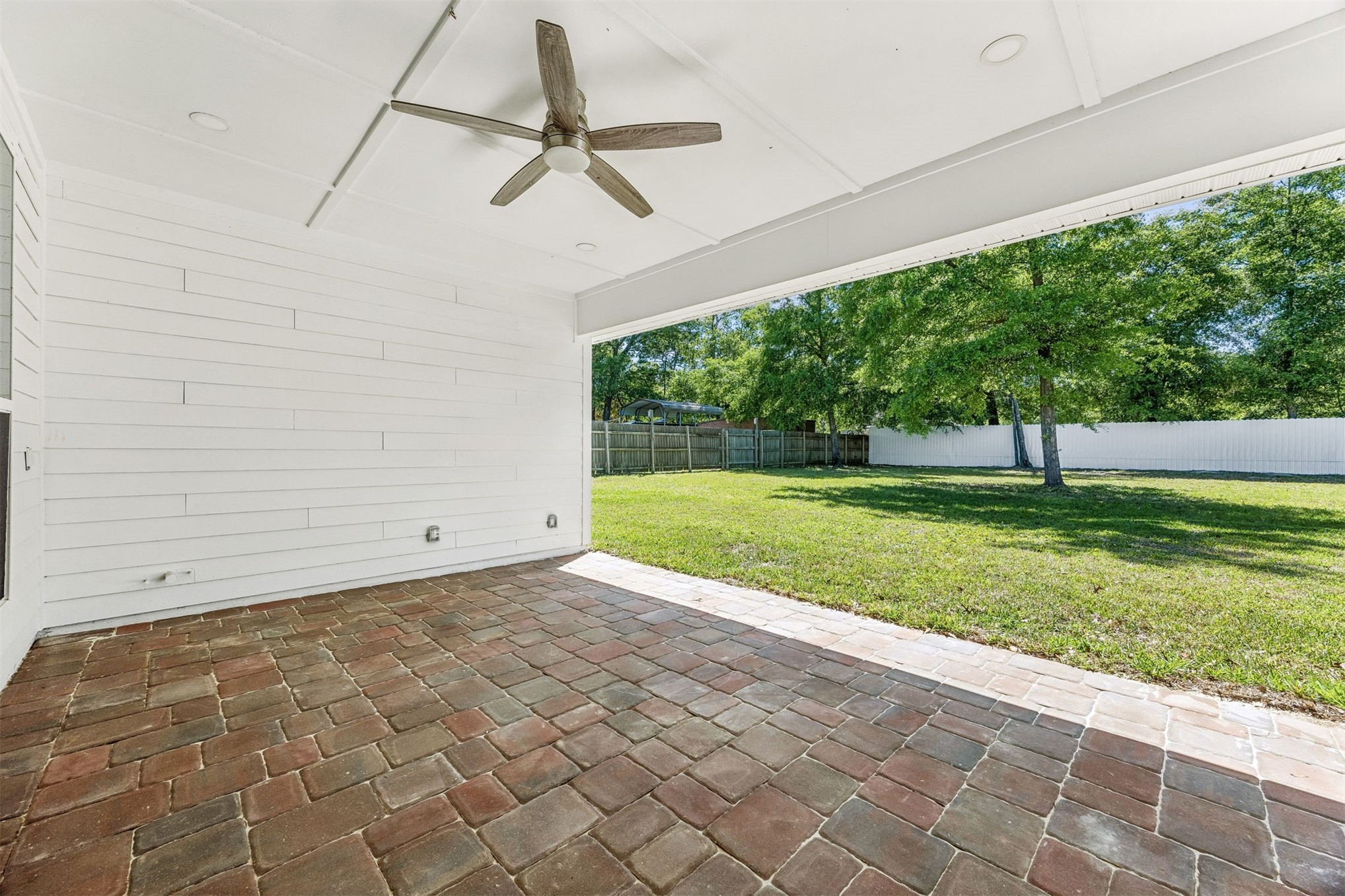 95121 North Ellis Landing Road Fernandina Beach, FL 32034 - Photo 32 of 37 a view of a garden with a tree