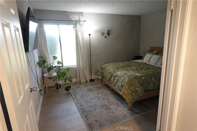 a view of parking garage with cars parked