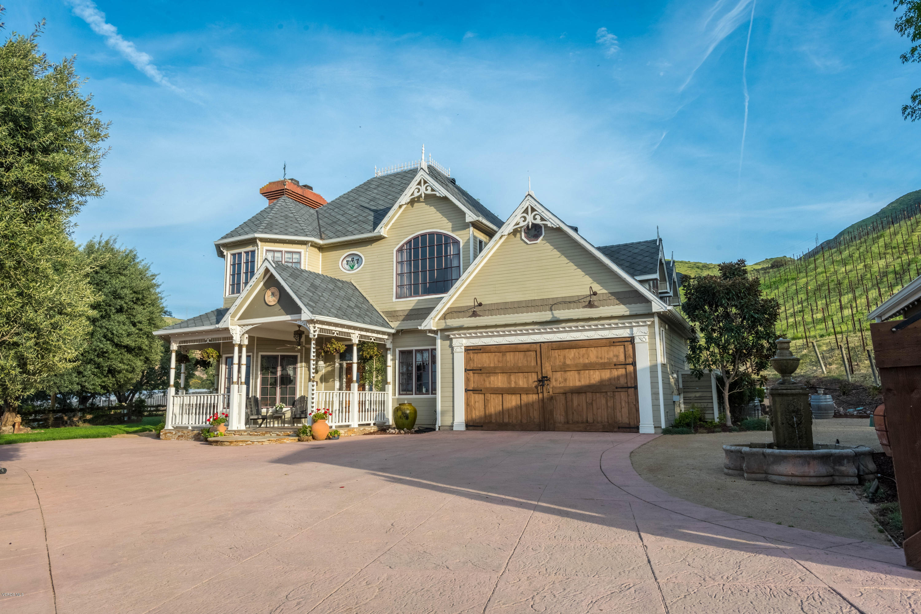 1735 Pancho Road Camarillo, CA 93012 - Photo 2 of 70 a front view of a house with a yard and garage