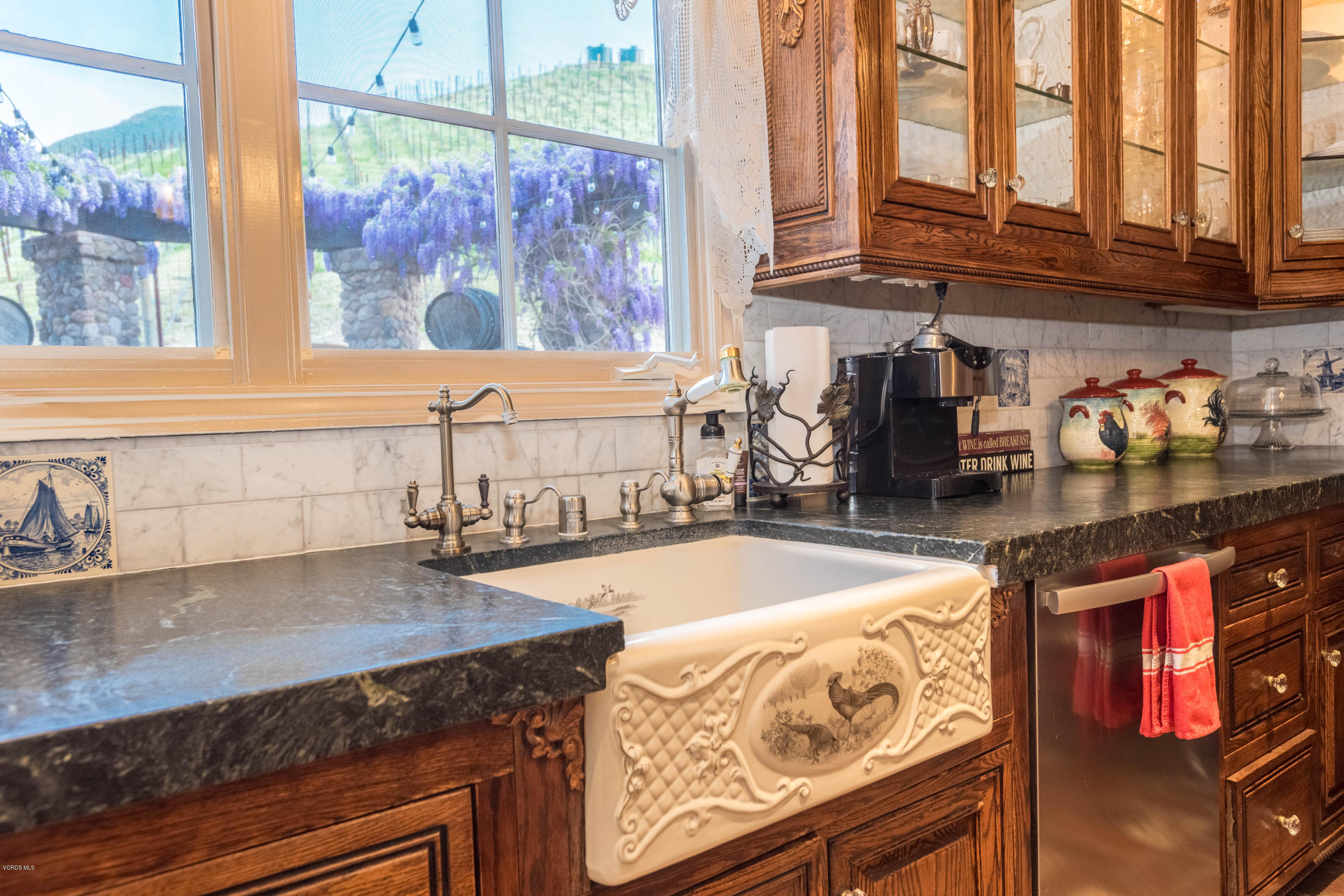 1735 Pancho Road Camarillo, CA 93012 - Photo 16 of 70 a kitchen with a stove and a sink