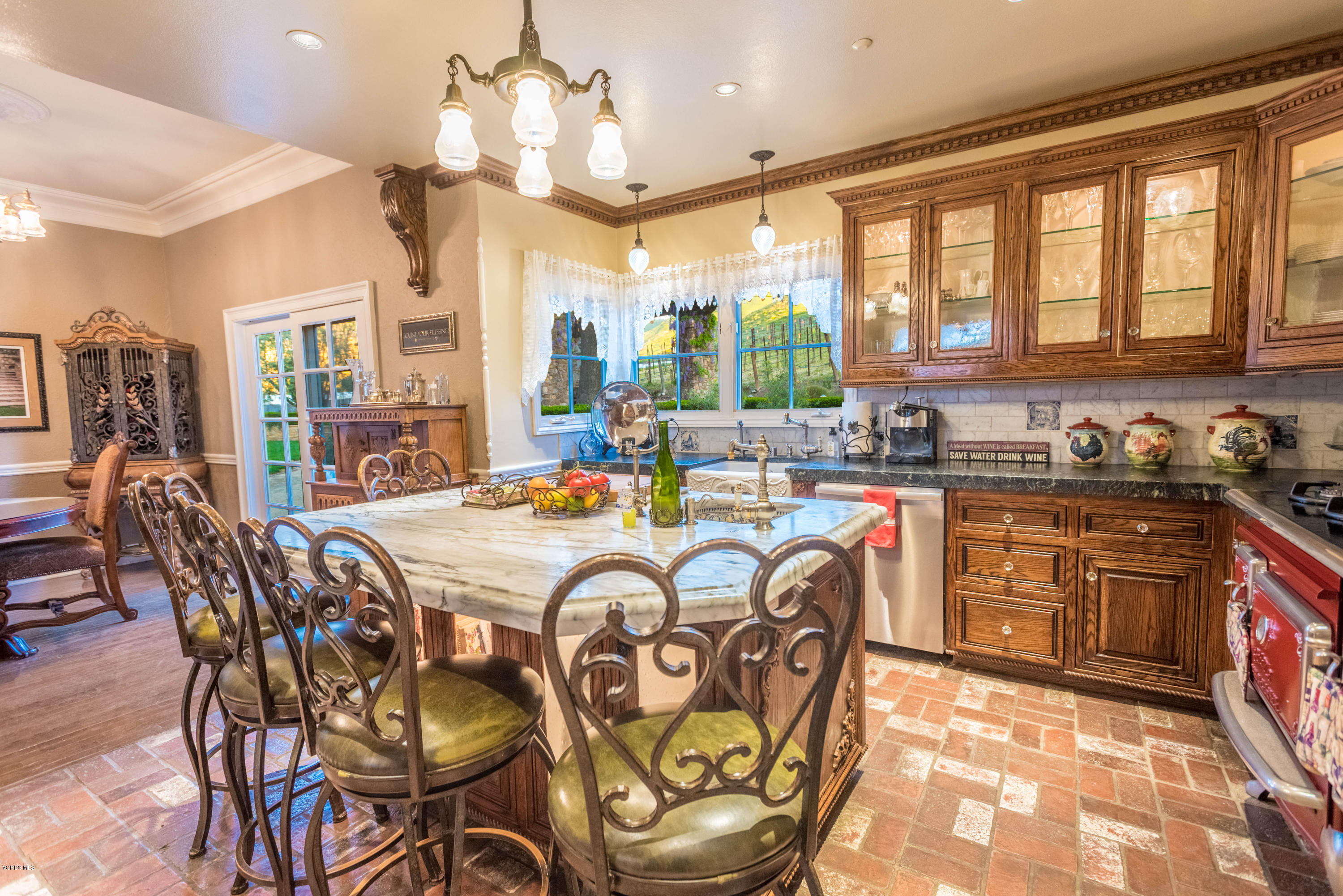 1735 Pancho Road Camarillo, CA 93012 - Photo 19 of 70 a very nice looking dining room with kitchen island furniture a large window and kitchen view