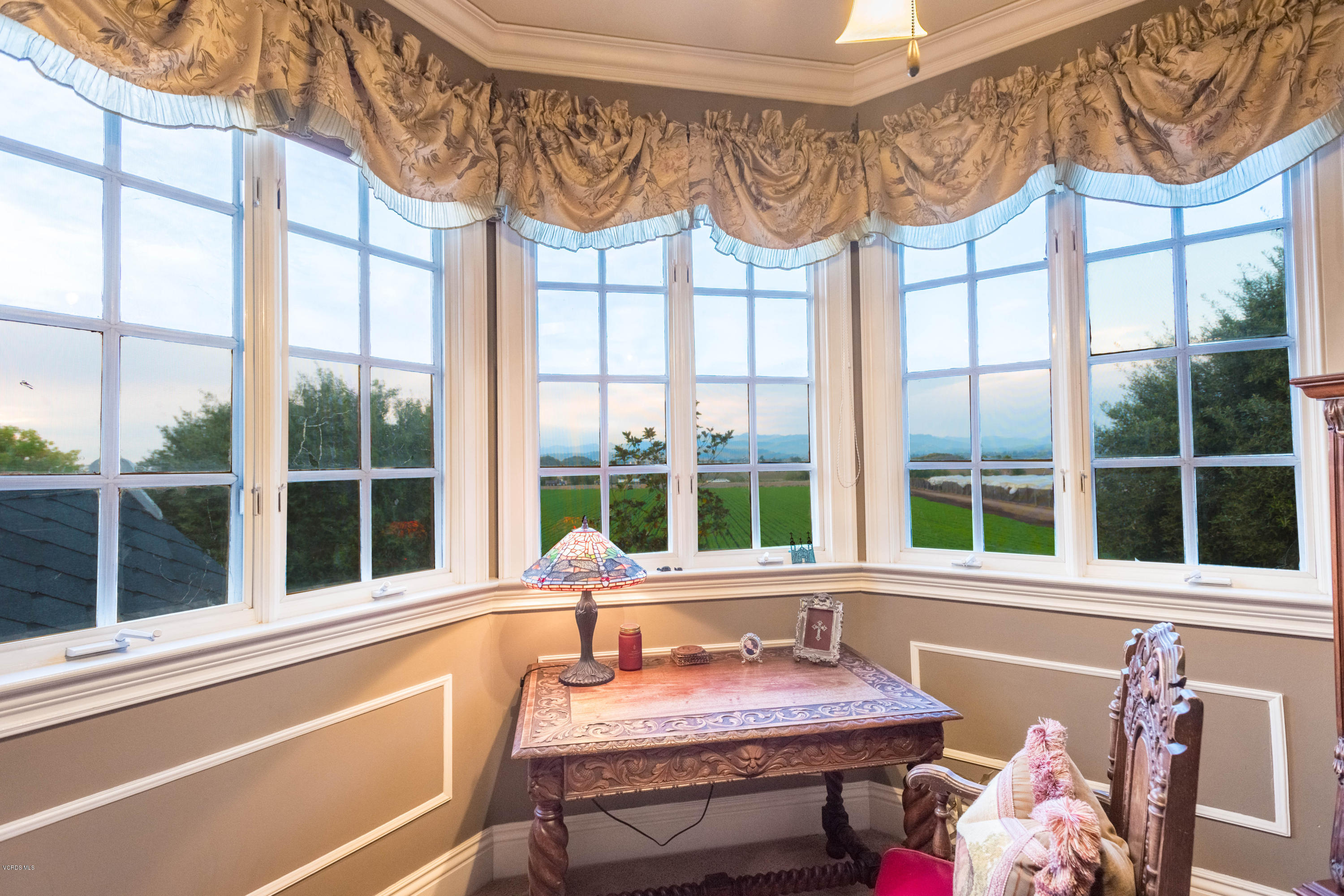 1735 Pancho Road Camarillo, CA 93012 - Photo 23 of 70 a room with furniture and a large window