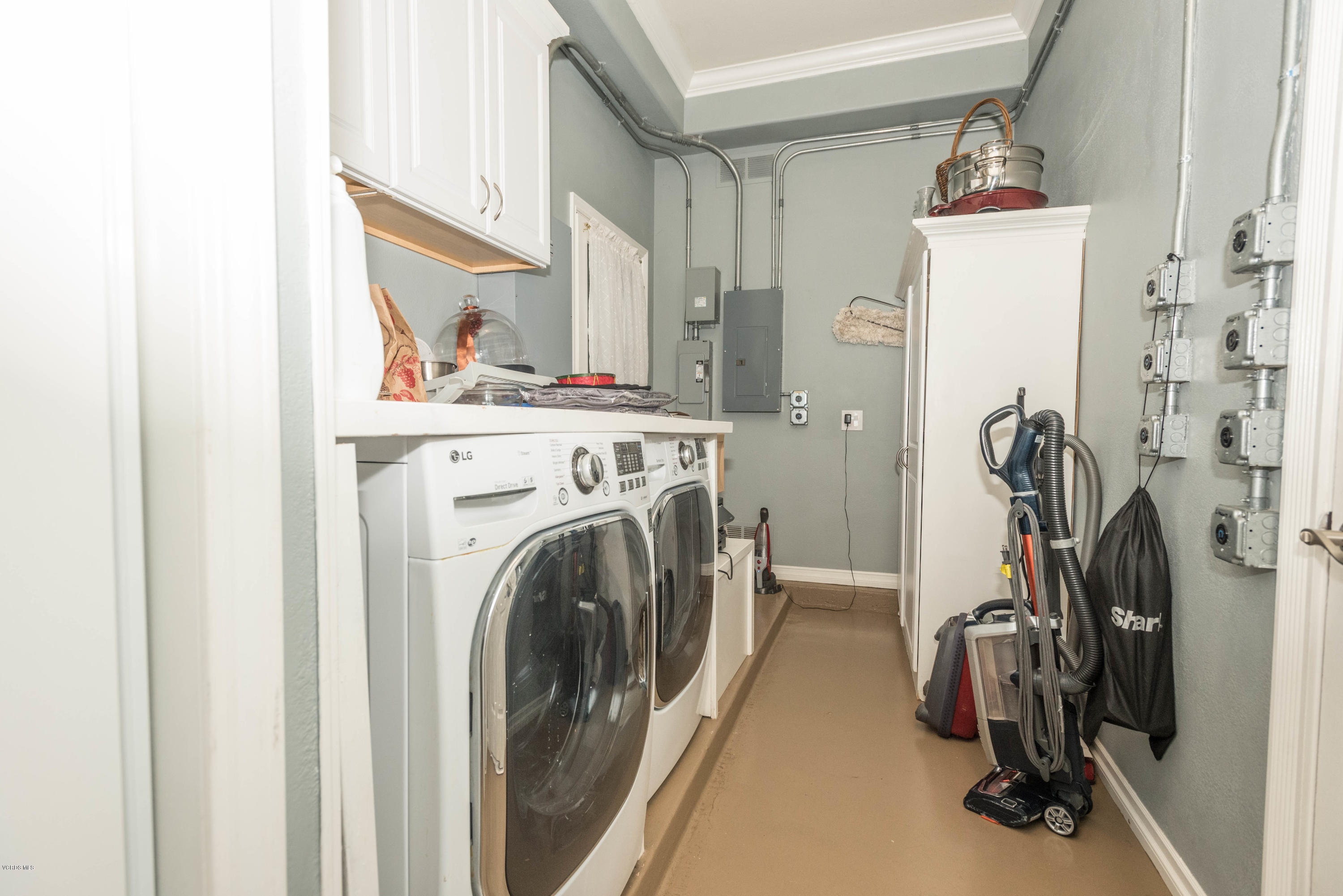 1735 Pancho Road Camarillo, CA 93012 - Photo 32 of 70 a view of a storage and utility room with refrigerator