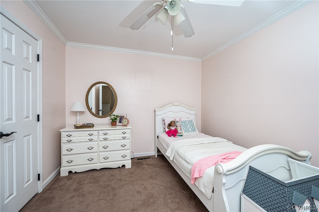 4901 Court Ridge Terrace Midlothian, VA 23112 - Photo 23 of 35 a bedroom with a bed and a dresser