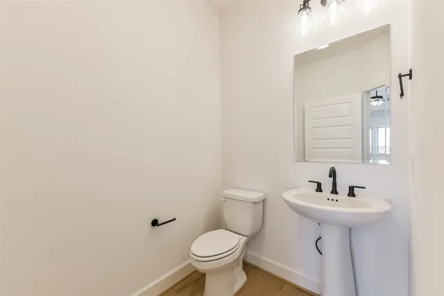 a bathroom with a sink and a toilet